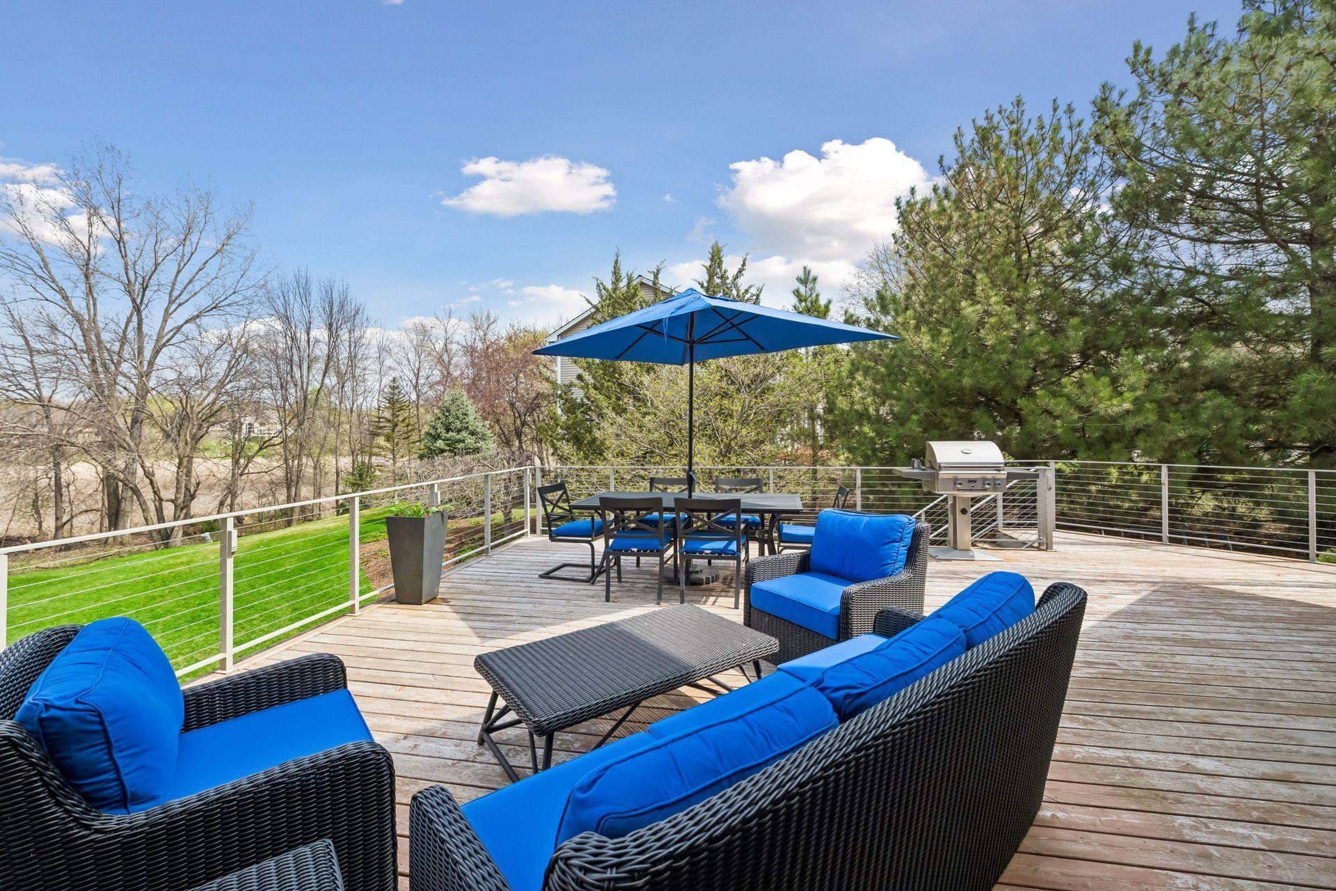 Expansive deck with room for lounging and gathering for meals.