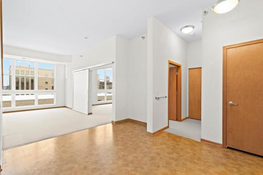 Open floor plan on main has kitchen, dining, living room, bedroom, walk in closet, laundry and full bath.