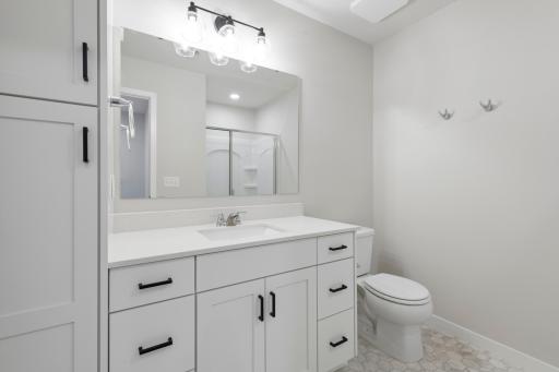 Convenient three-quarter bath located in the finished lower level.