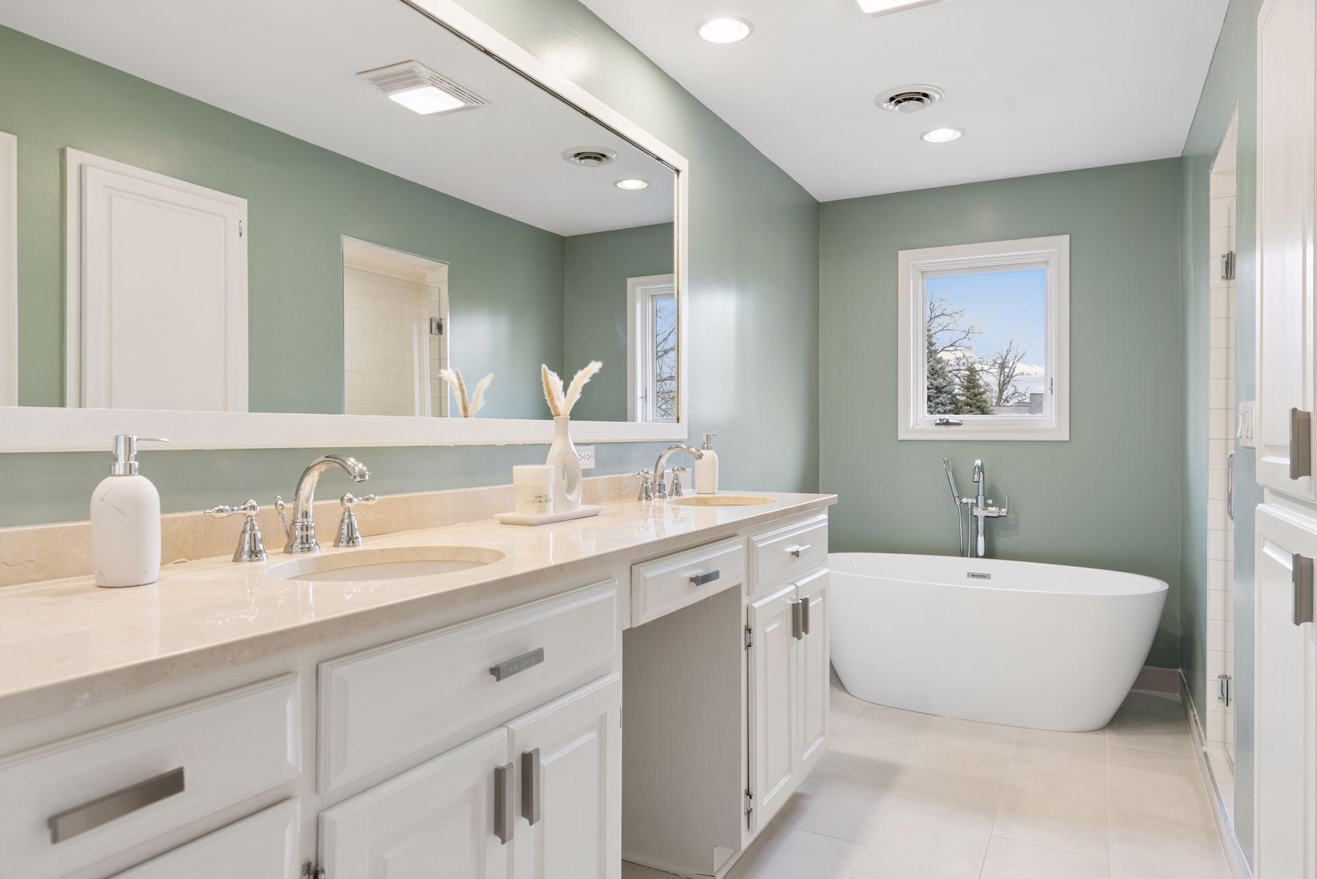 Completely renovated spa-like bathroom in the primary suite.