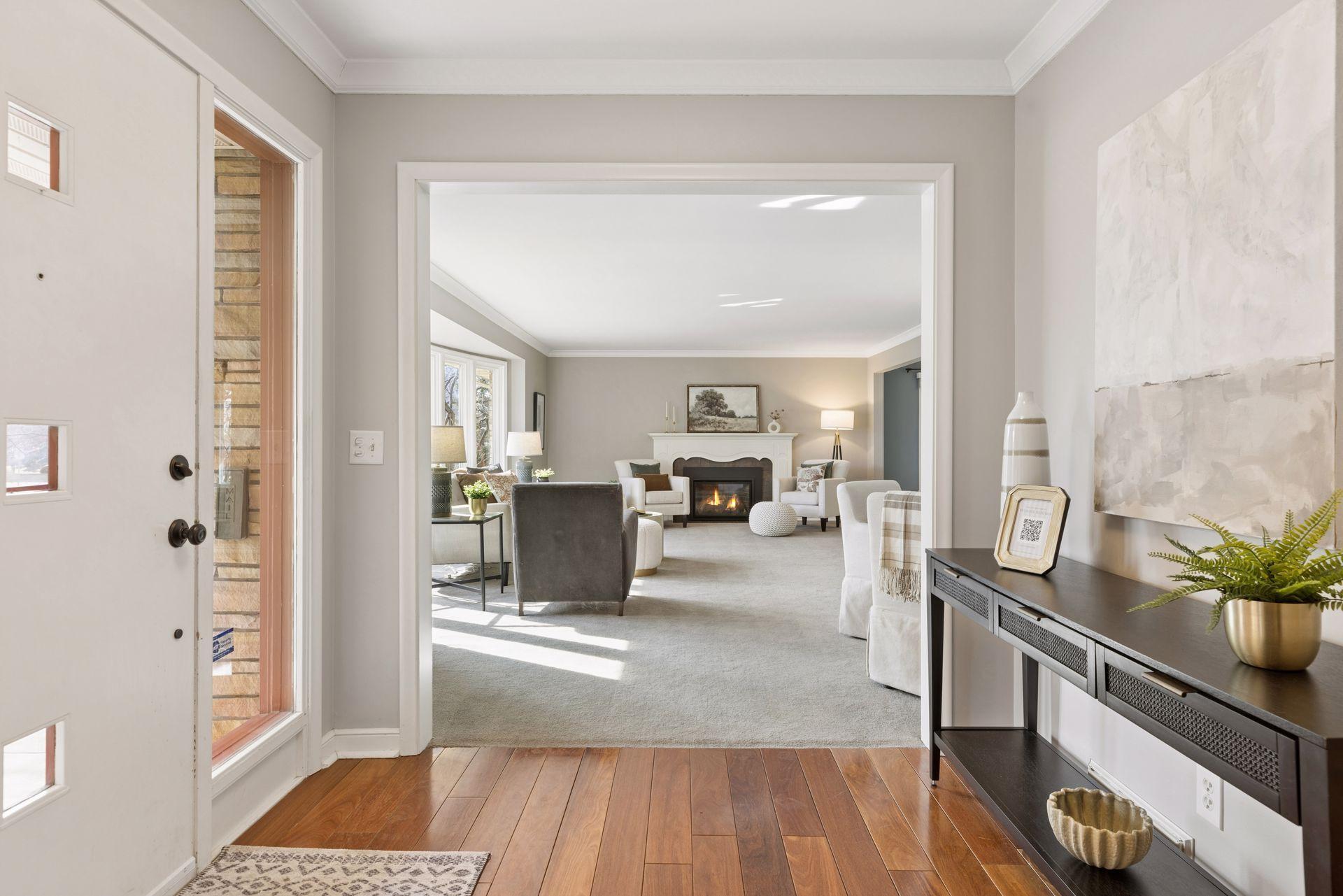 Front entrance & foyer. Beautiful hardwood flooring throughout parts the main level.