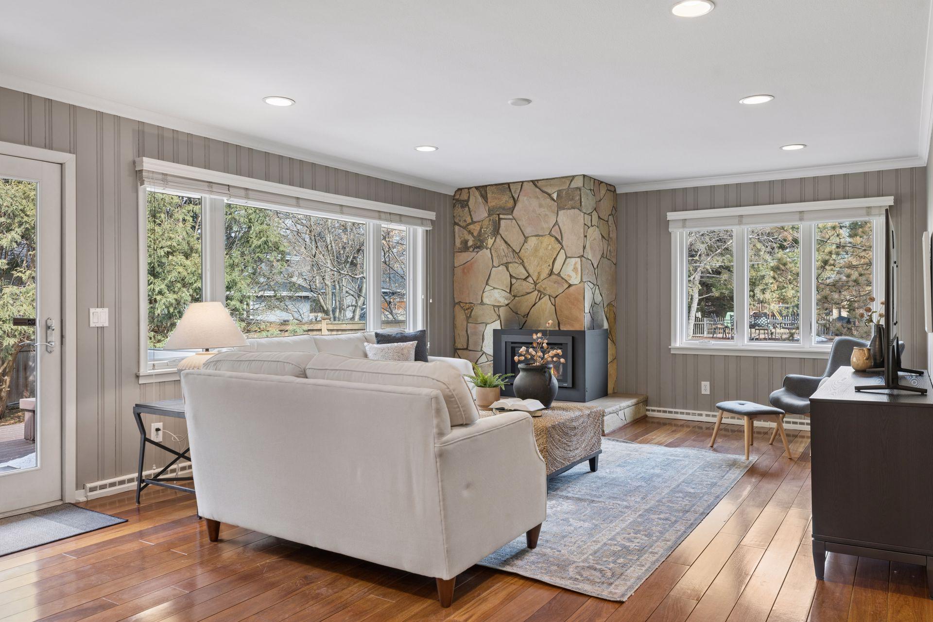 Cozy den just off the kitchen with NEWLY ADDED gas fireplace. Amazing natural light!