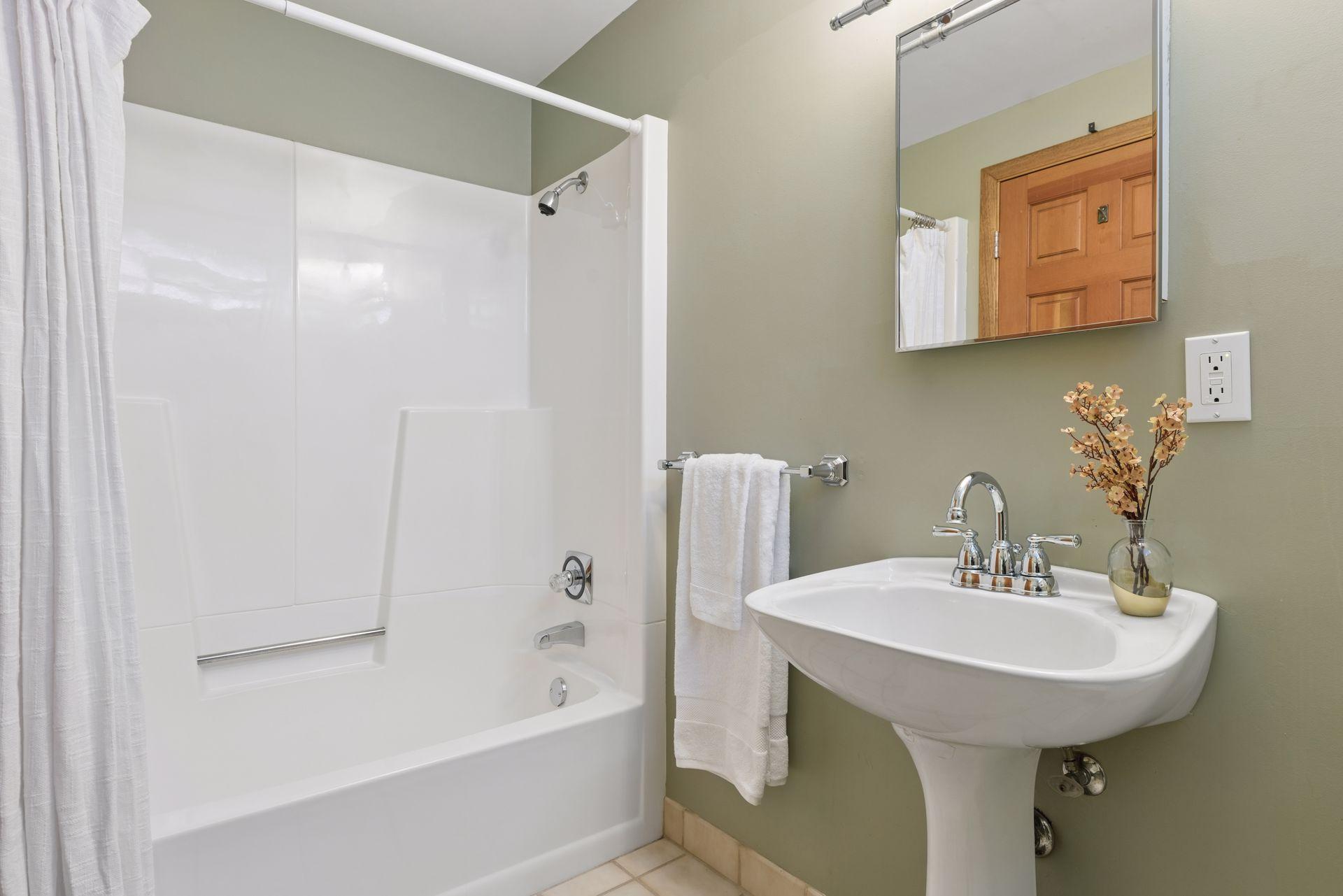 The basement full bathroom.