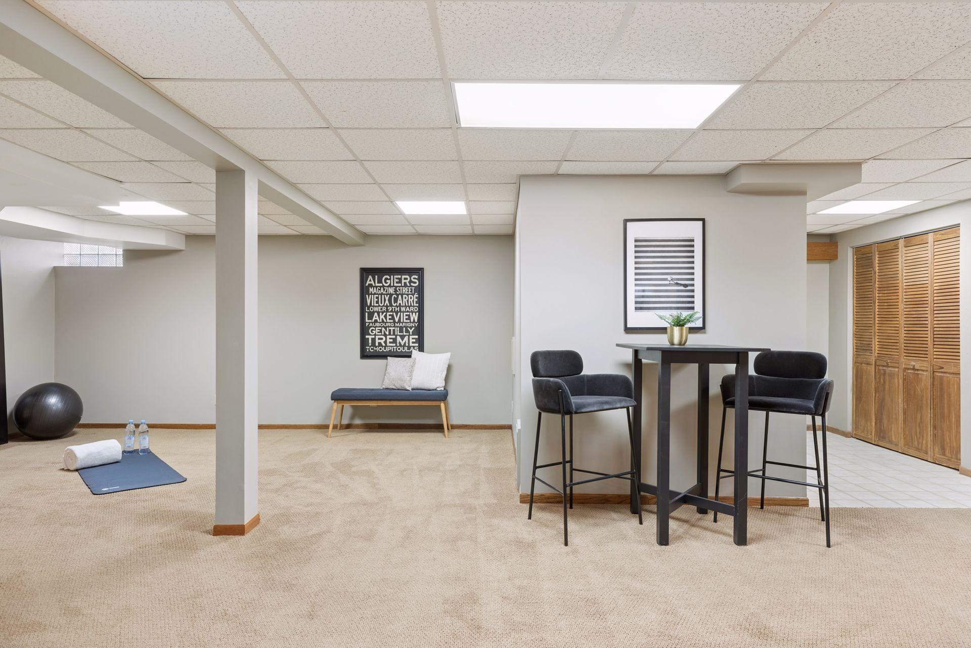 The multi-functional area of the basement works well for exercise.
