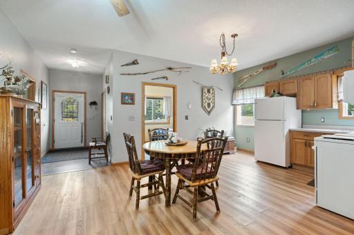 Dining room view to bedroom 1 and front entry