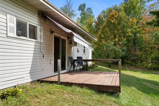 Large deck with crank awning to offer additional shade
