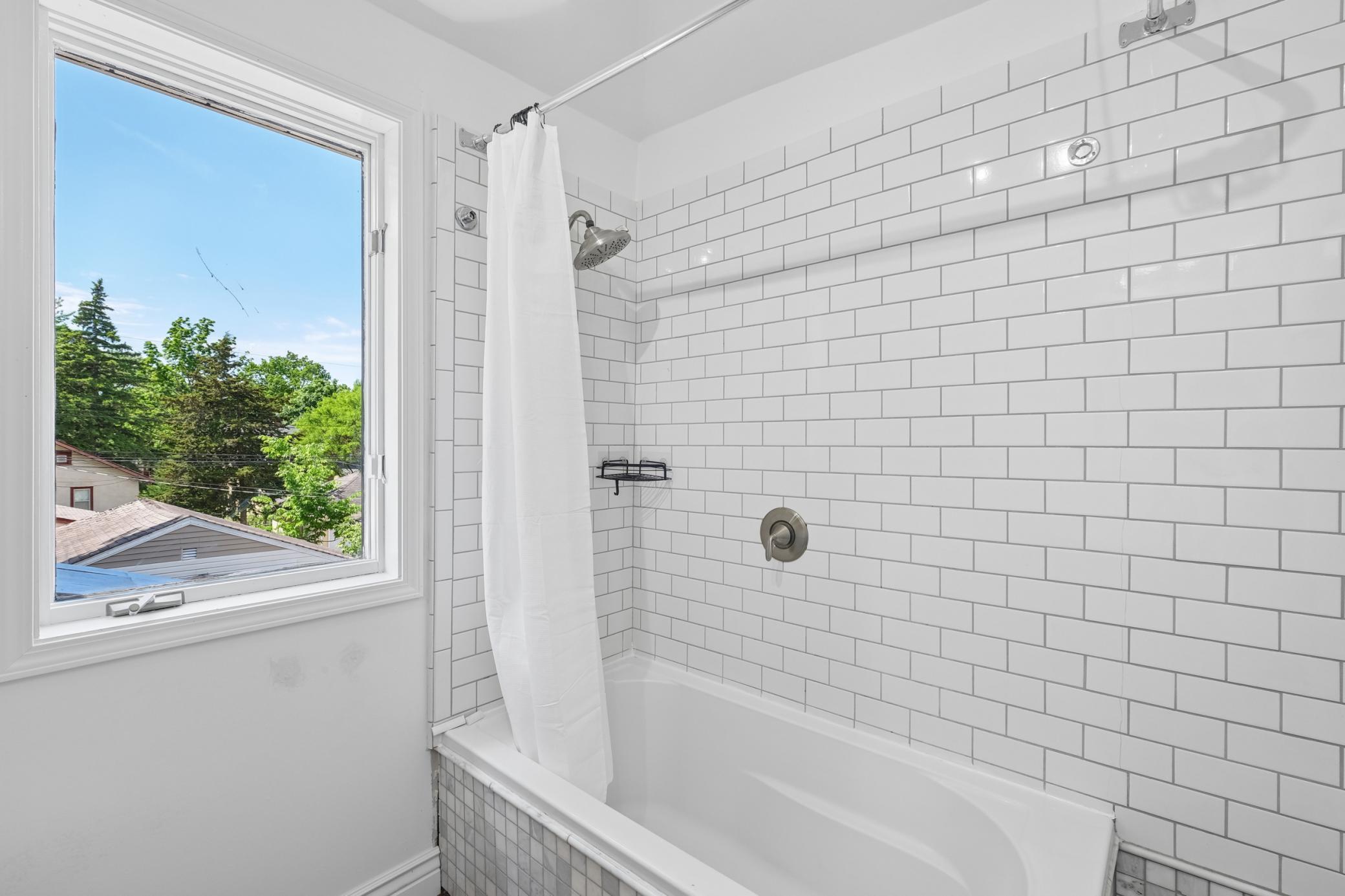 Newly renovated full bath on the second floor