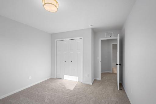 Second Bedroom (Photo of similar home - Colors and selections will vary)