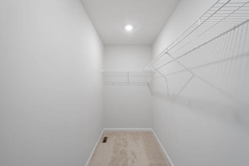 Owner's Closet (Photo of similar home - Colors and selections will vary)