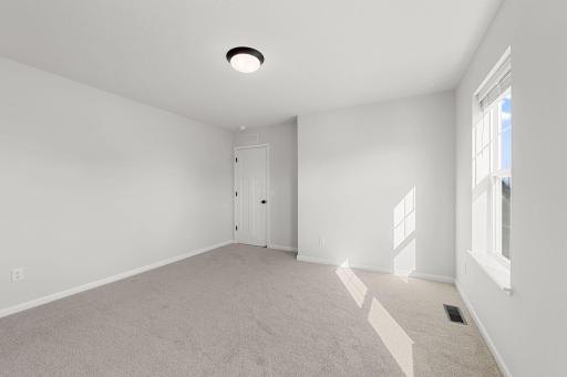 Second Bedroom (Photo of similar home - Colors and selections will vary)