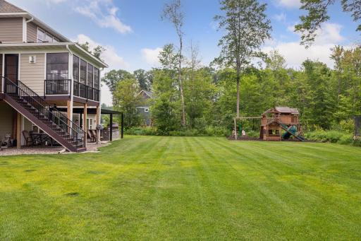 A flat, expansive lawn offers the perfect setting for lawn games and outdoor playâall with the added privacy of no backyard neighbors thanks to the adjoining wildlife preserve.