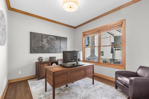 Spacious main floor office with hardwood floors