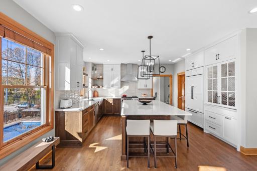 Modern sun filled kitchen is the ideal space for cooking, gathering and entertaining.
