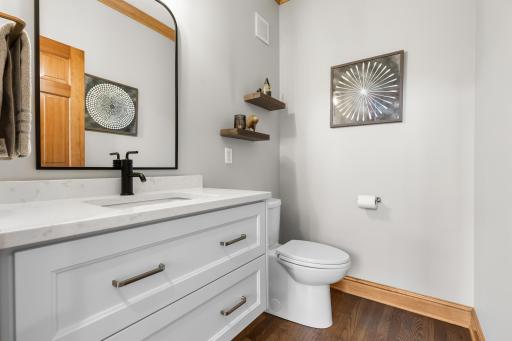 Main level, newly remodeled modern powder room.