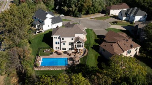 Located on a cul-de-sac with mature trees, backyard pool and privacy.