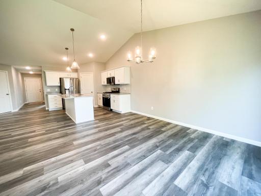All photos of previously finished home of same floor plan