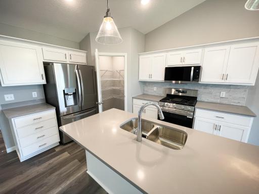 All photos of previously finished home of same floor plan