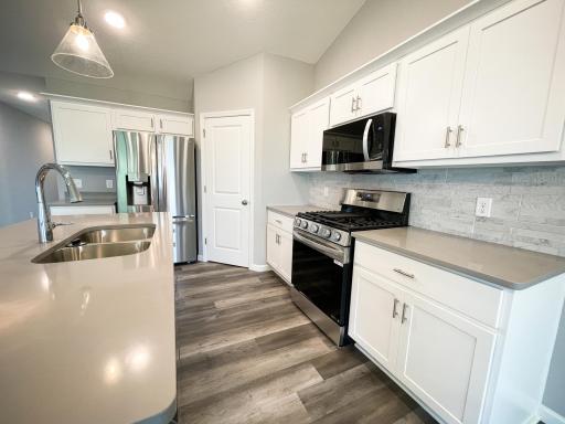 All photos of previously finished home of same floor plan
