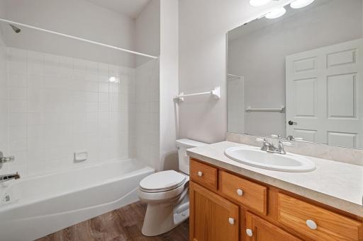 The 2nd bathroom has luxury vinyl plank flooring. The tub/shower has almost never been used.