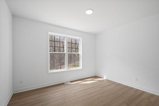 A private office on the first level makes for an ideal home work station.