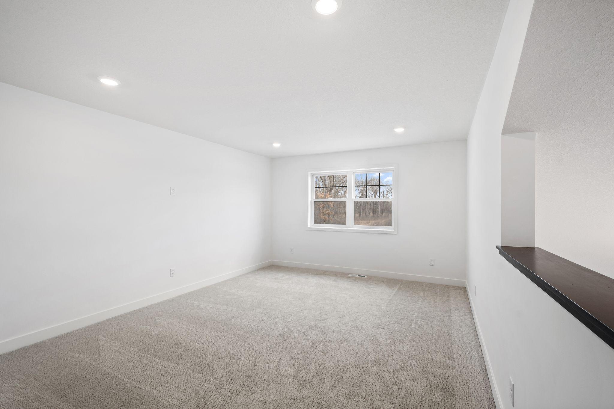 A large loft overlooks the second level and adds more shared living space.