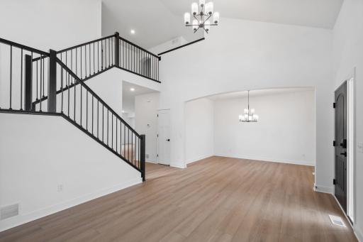 Near the entry is a formal dining room, ideal for everything from Sunday dinners to holiday celebrations.