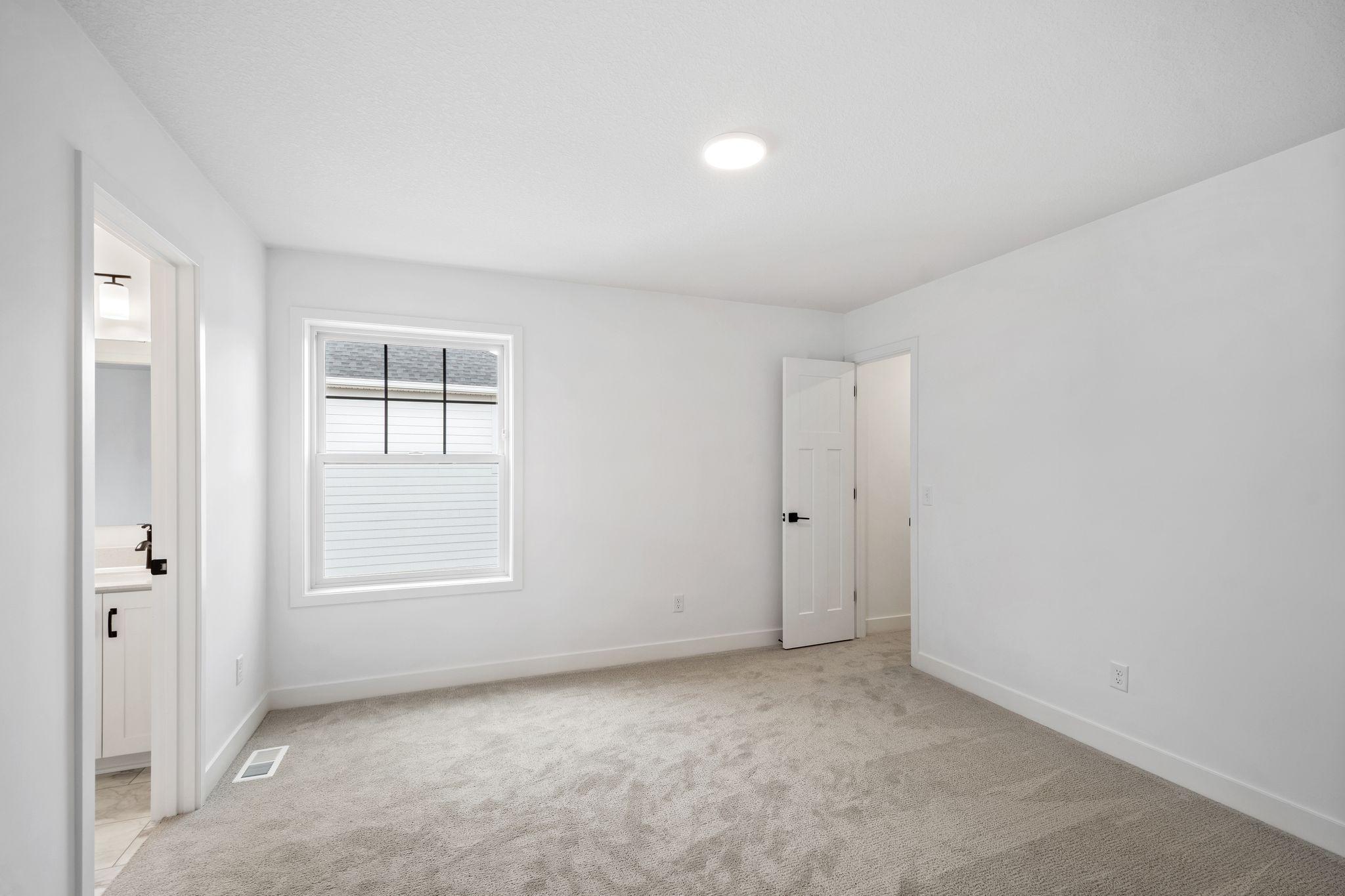 Each secondary bedroom enjoys a spacious walk-in closet