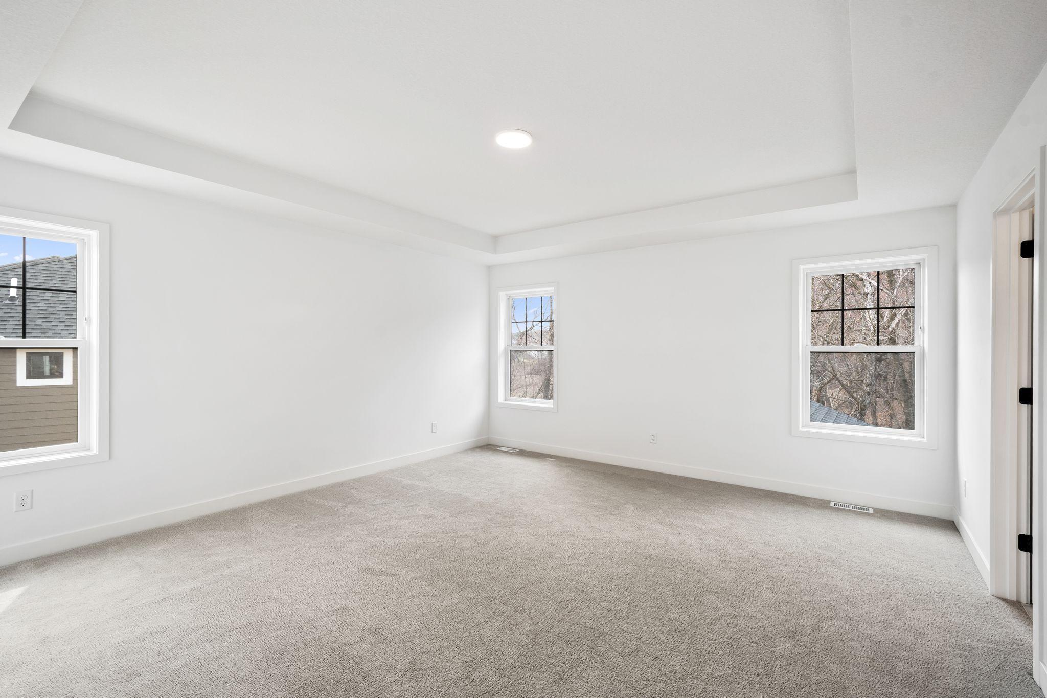 Situated on the second floor is the spacious and luxurious owner's suite, complete with a large spa-inspired bathroom and expansive walk-in closet.