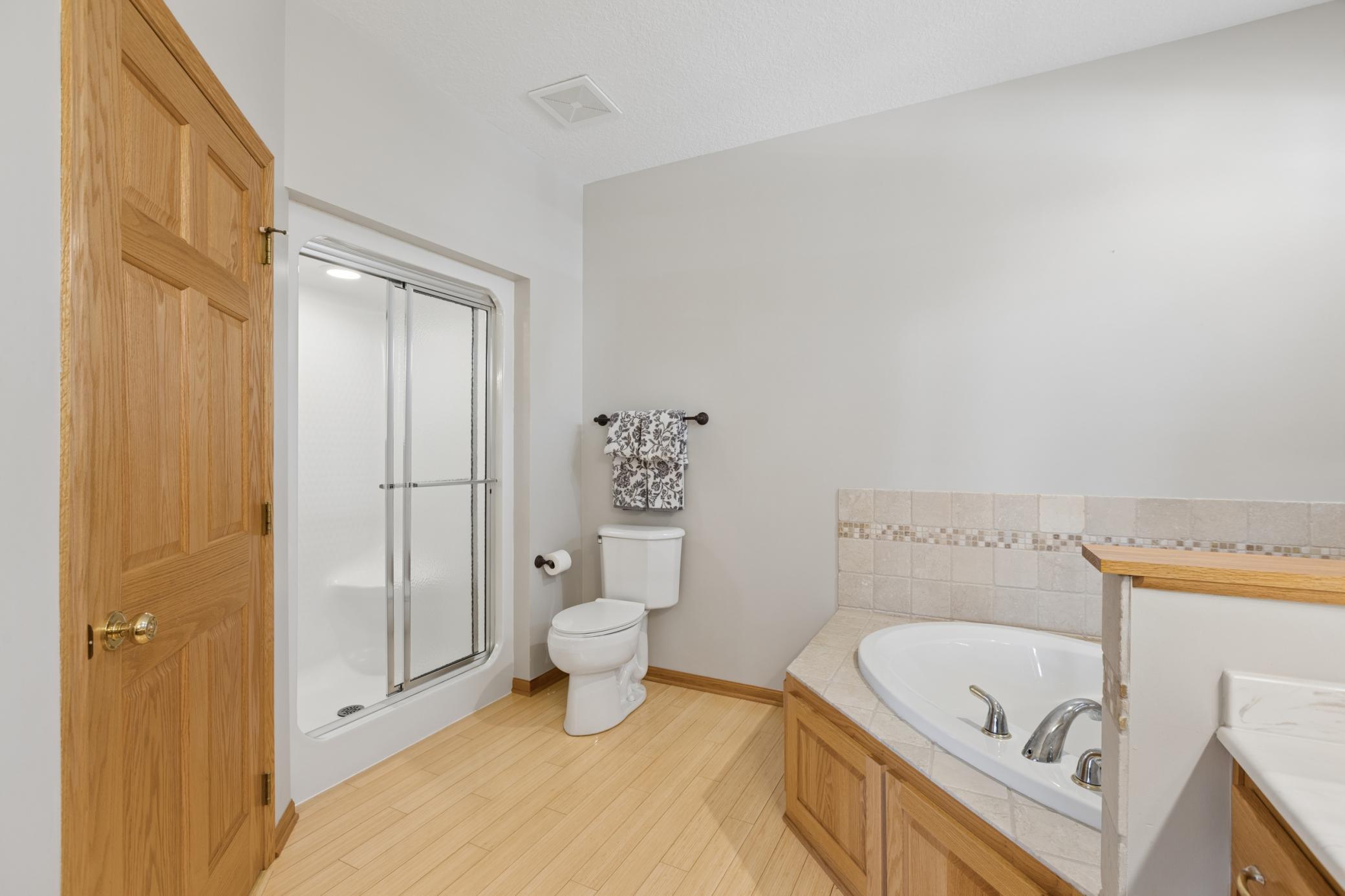 With separate tub and shower this spacious ensuite is a great touch to the total package this property has to offer. To the left of the shower is the 7x6 walk-in closet.