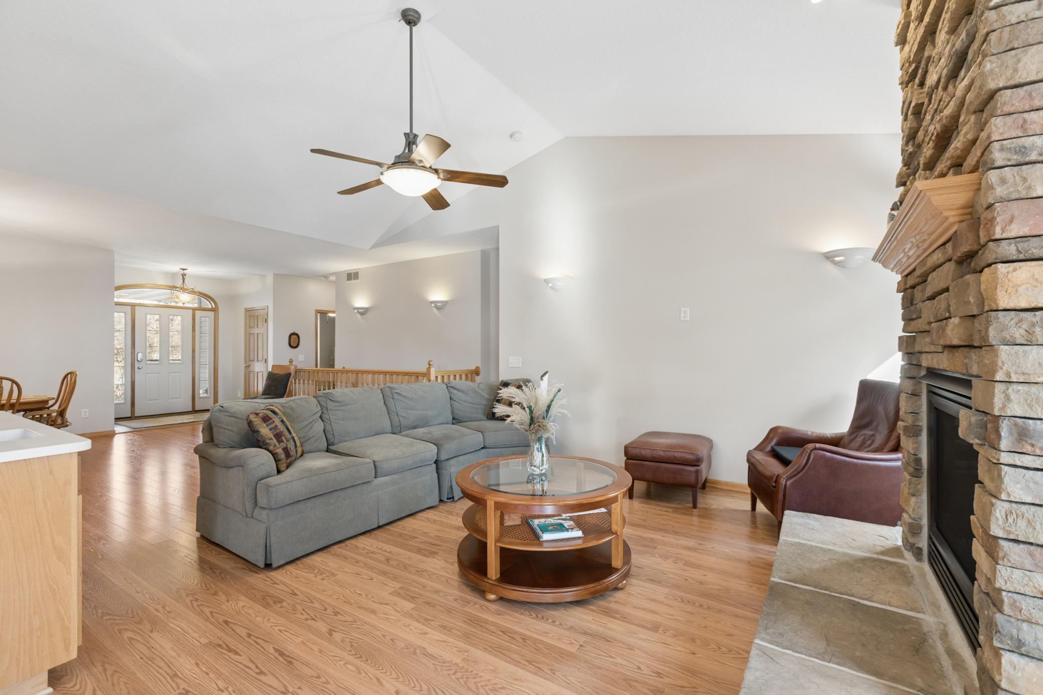 The open design of this home with plentiful natural light from the oversized lakeside windows is a wonderful design element that was well thought out while the home was custom built.