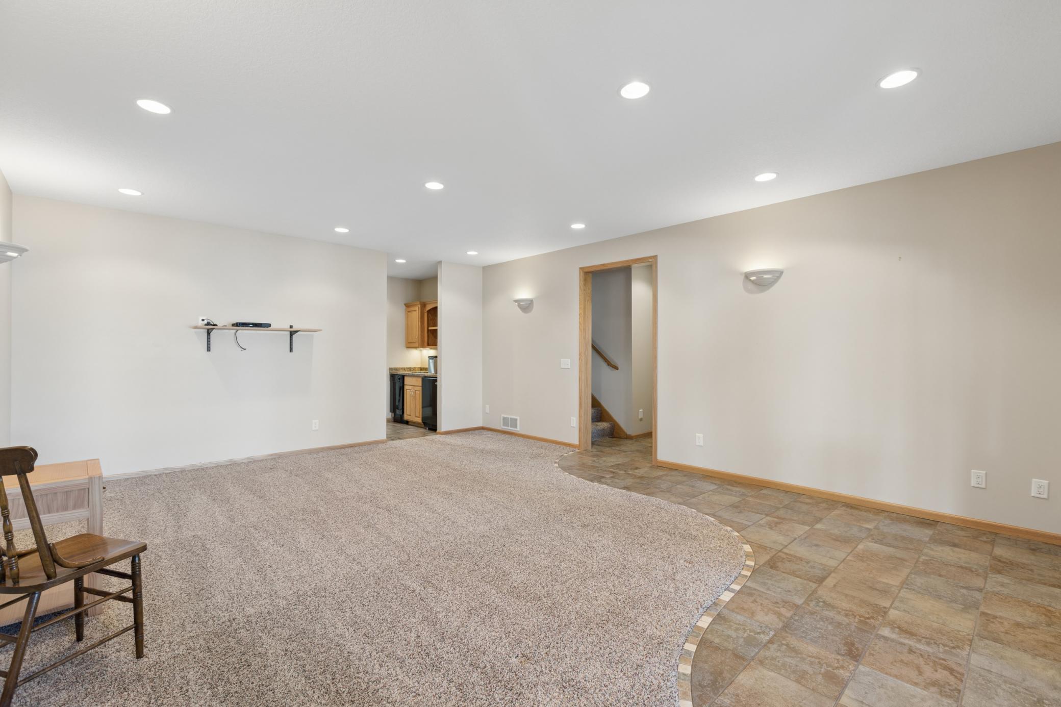 The lower-level living room is 17x21 and is a very flexible space for however you dream to use it.