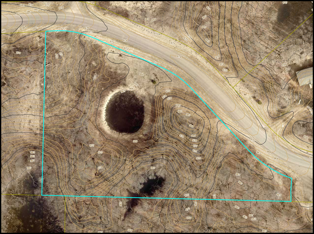 A potential pond adds unique character and attracts wildlife, creating a serene retreat to enjoy year-round. Just minutes from the Apple Lake boat launch.