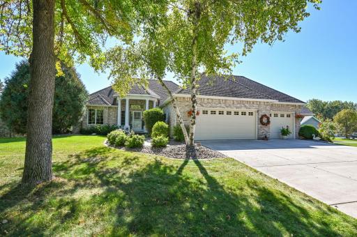 Custom Built Executive Walkout Rambler has an Awesome in-ground pool, gazebo, hot tub, privacy fenced with private mature year round trees, patio and deck