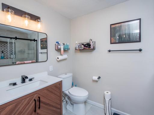 Upper level updated 3/4 ensuite bathroom.