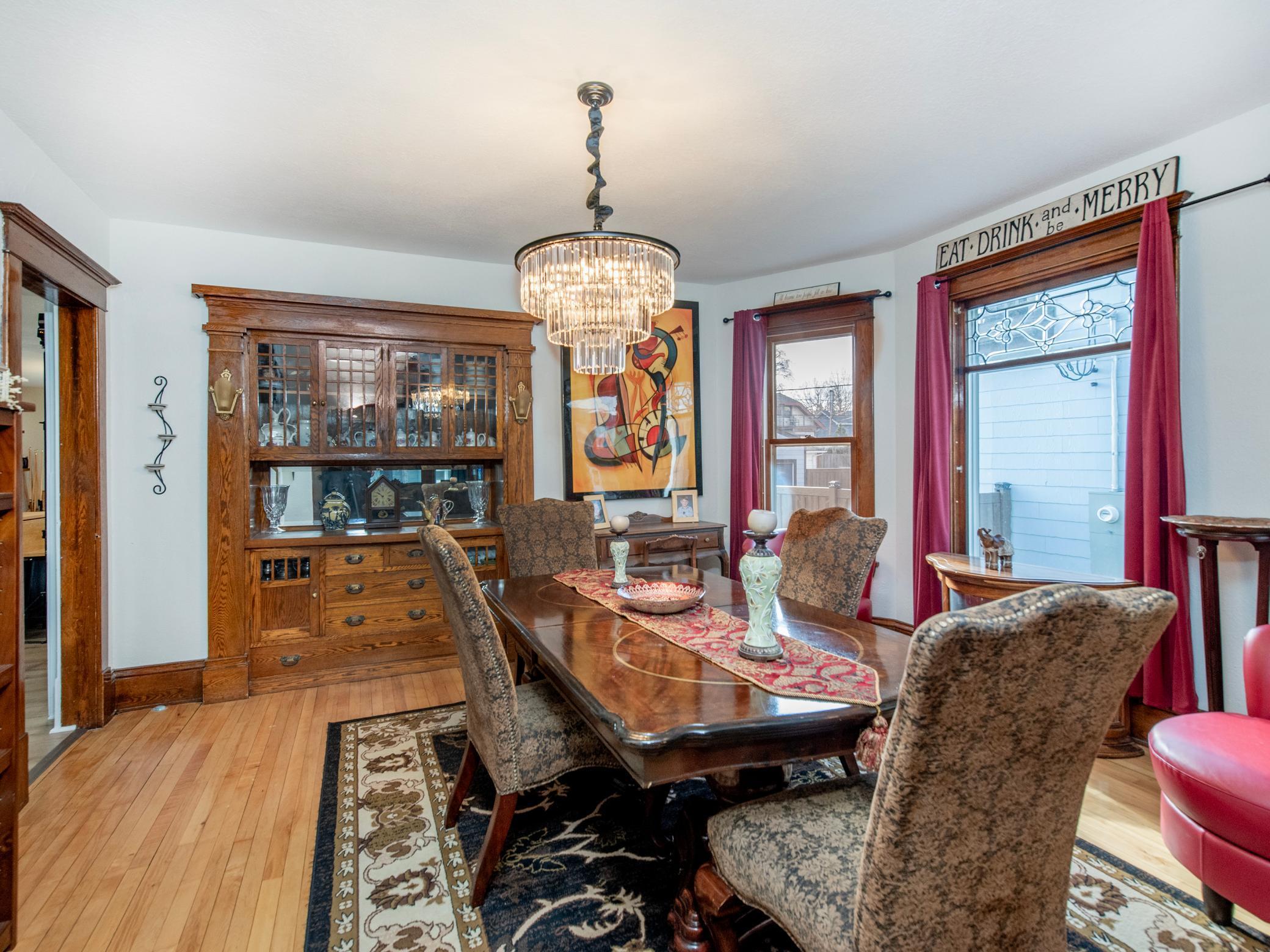 Formal dining room with refinished hardwood flooring, gorgeous windows!
