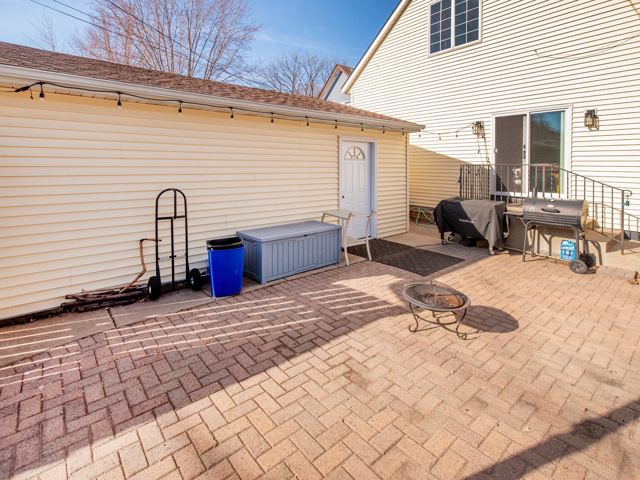 Large paver patio, great for entertaining! Easy access to the two-car garage.
