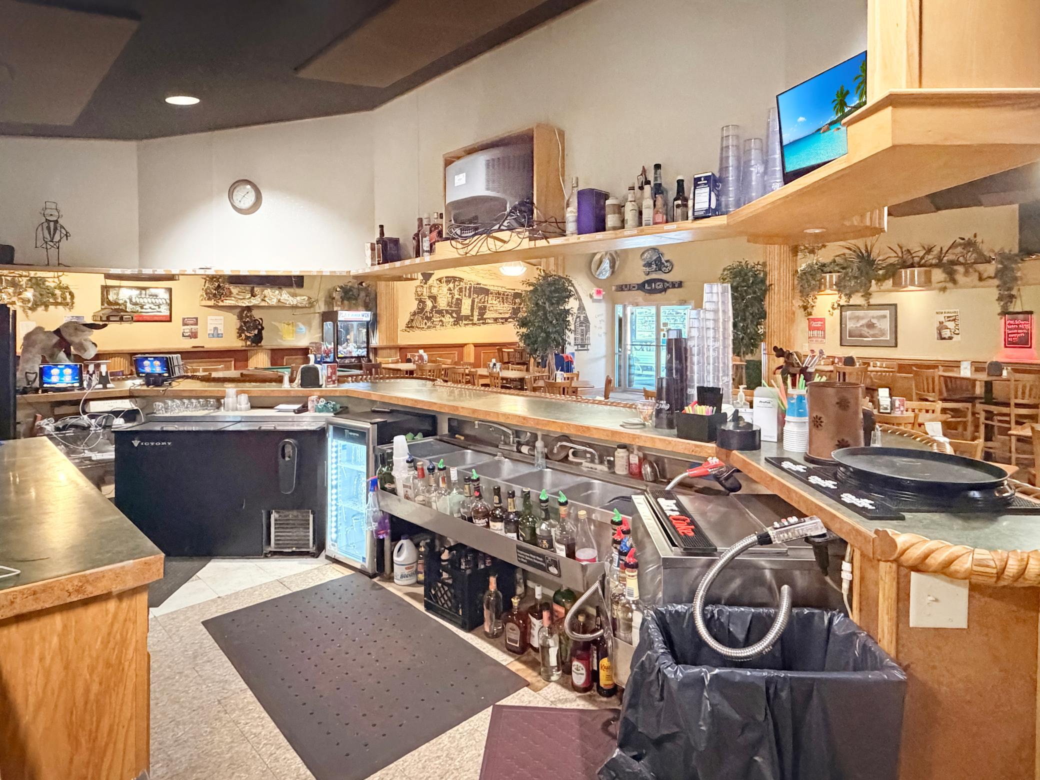 Behind the bar in the restaurant side