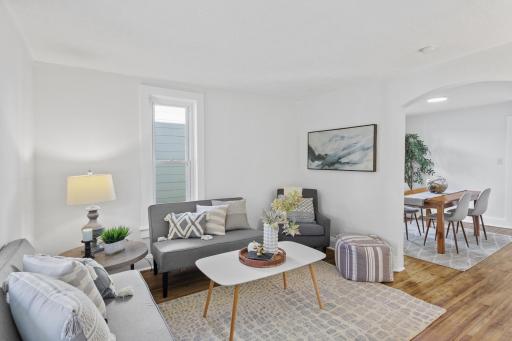 Photo for 844 Howell Street N, Saint Paul, MN 55104 - listing #7001288 Main level: living room with refinished hardwood floors and all new paint