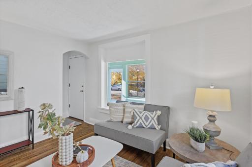 Main level: living room with refinished hardwood floors and all new paint