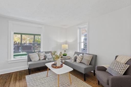 Main level: living room with refinished hardwood floors and all new paint