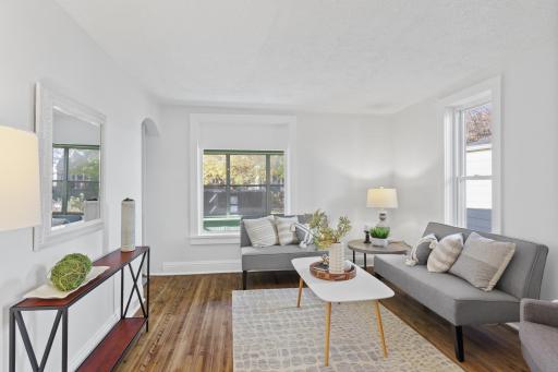 Main level: living room with refinished hardwood floors and all new paint