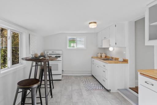 Main level: kitchen with new LVT flooring