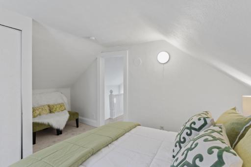 Upper Level: primary bedroom with all new carpet and paint