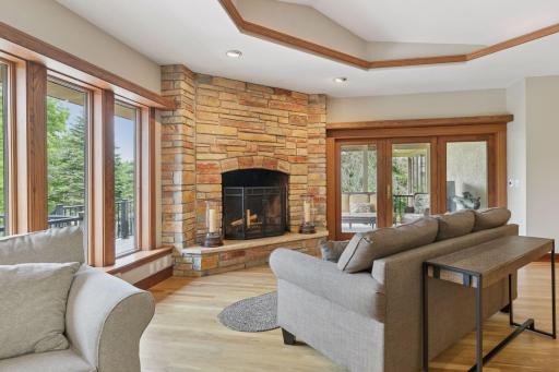 A wood-burning fireplace anchors the space with warmth and timeless character âperfect for cozy fall mornings or evenings by the fire with a glass of wine.