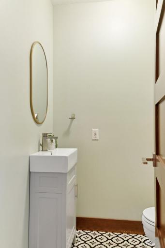 This main floor powder room is as stylish as it is practical.