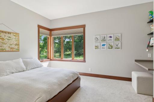 The additional bedrooms are perfect for kids, guests, or creating a dedicated home office, all just steps from the main living spaces.