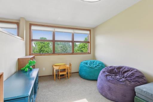 This space works beautifully as a playroom, office, or tucked-away guest suite.