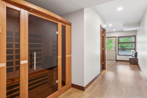 Experience the soothing warmth of your own spa-inspired infrared sauna. Conveniently located on the lower level with walkout access to the pool and sport court, itâs the perfect place to relax after a swim or unwind following a workout.