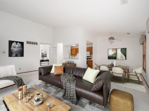 Virtually staged Living room and dining room.