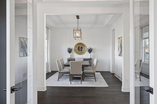 The formal dining room sets the tone for a warm welcome and memorable gatherings.
